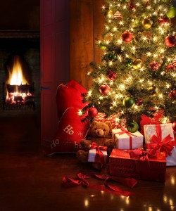 Christmas scene with tree and fire in background